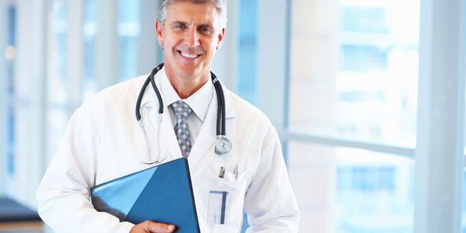 doctor treating nail fungus